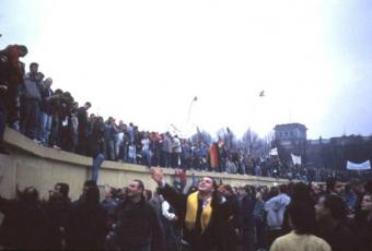 People celebrating on the Wall near the Reichstag building, 12 November 1989