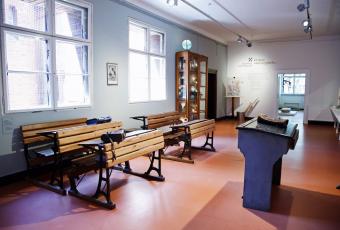 A classroom with original furniture from around 1900